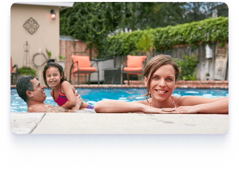 A family enjoys time together in a pool, featuring a child and a woman, highlighting flexible pool construction options.